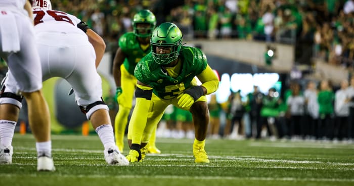 Oregon Ducks defensive lineman Brandon Dorlus lines up to rush the passer against the Stanford Cardinal.